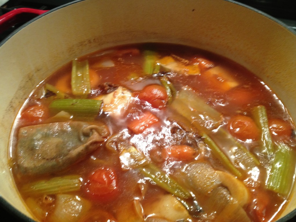 paleo brown stock cooking in a pot