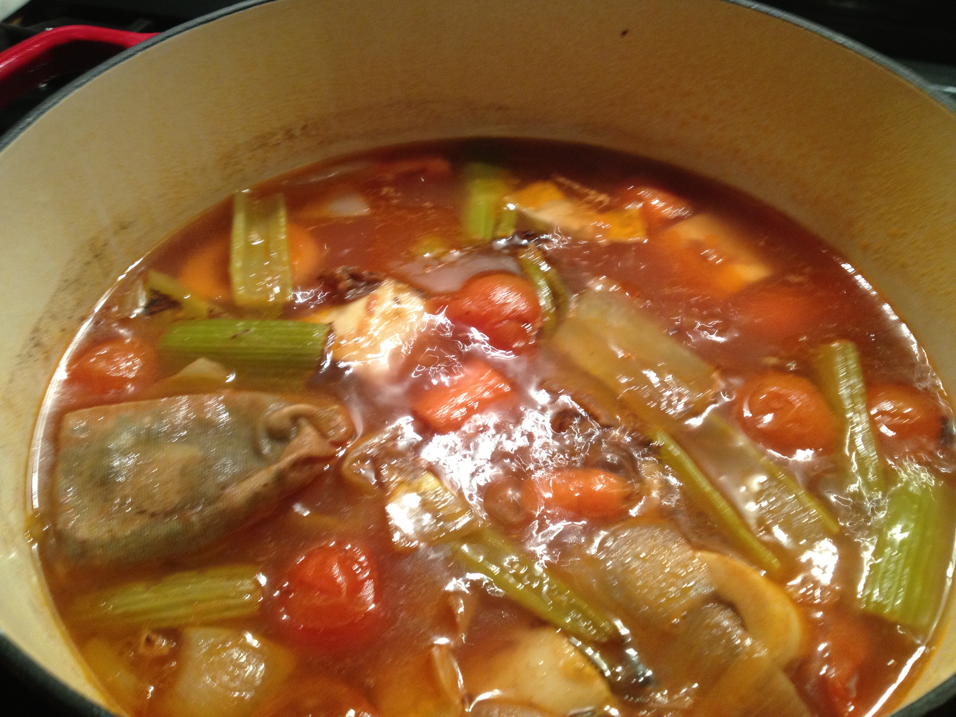 paleo brown stock cooking in a pot