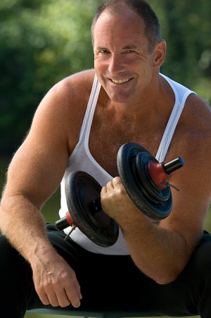 50 year old man with weights