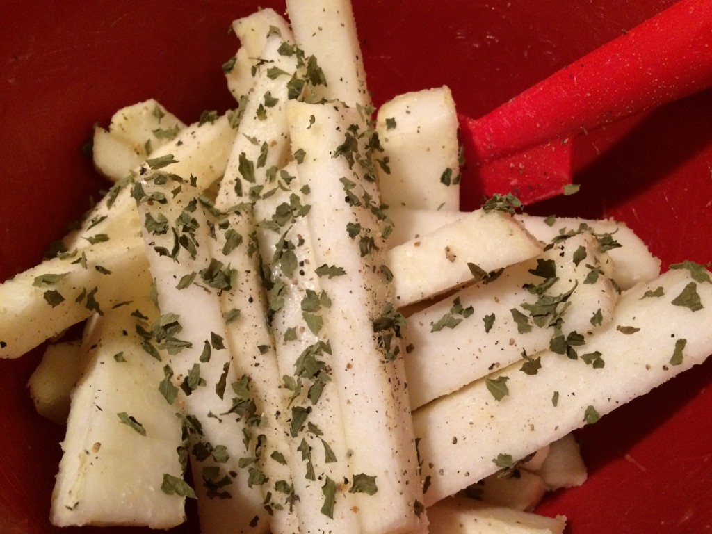 Add seasonings to turnips and coat.